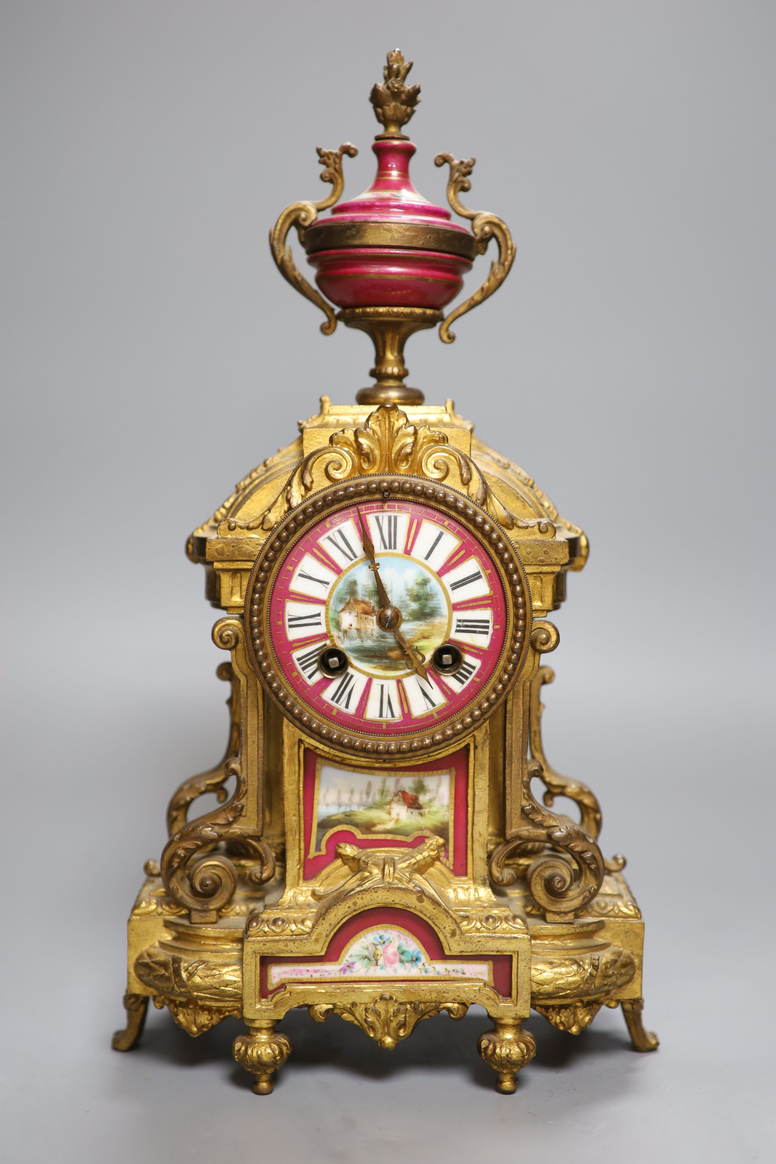 A Louis XVI style eight day mantel clock, height 36cm